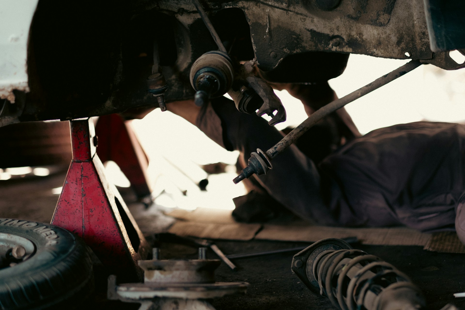 Mechanic performing a transmission rebuild inspection